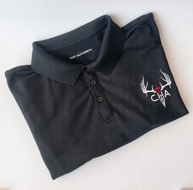 Shop for a black polo shirt with a deer embroidered on it.